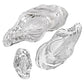 The Ocean Oyster Bowl Collection by Beatriz Ball features three clear glass dishes in varying sizes, inspired by oyster shell shapes and displayed on a white background.