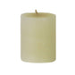 The Votive Candle Set by Perin Mowen features hand-rolled, off-white pillar candles with visible wicks, crafted for a clean burn and artisanal appeal, shown upright against a white background.