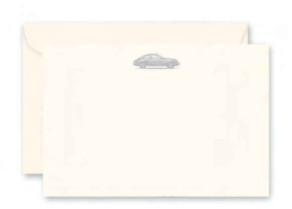 The Crane Engraved Porsche 911 Correspondence Note Card Set features cream-colored cards and envelopes with a detailed classic Porsche 911 illustration, offering a stylish design by Crane.