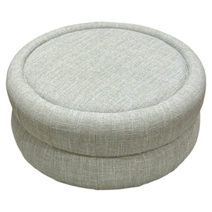The Chloe Ottoman by Hickory Chair features a round, upholstered design in light grey fabric with a smooth, padded top and minimalist style.