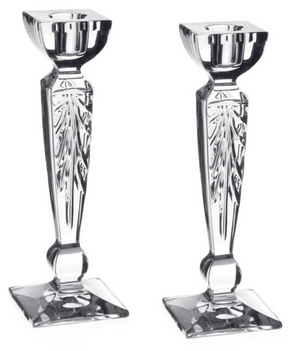The Iris Candlestick Pair by William Yeoward Crystal features clear, faceted glass with square bases and geometric details—ideal for adding elegance to a mantle or gifting as a wedding present.