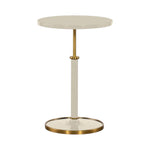 Highland House Olsen Accent Table, a round cream-colored lacquer table with a central post and a metallic brass base.