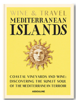 Assouline’s "Wine & Travel Mediterranean Islands" book cover features a sun with a face on a yellow background, with black and gold text highlighting vineyard journeys from Sicilian wines to Greek Assyrtiko discoveries.