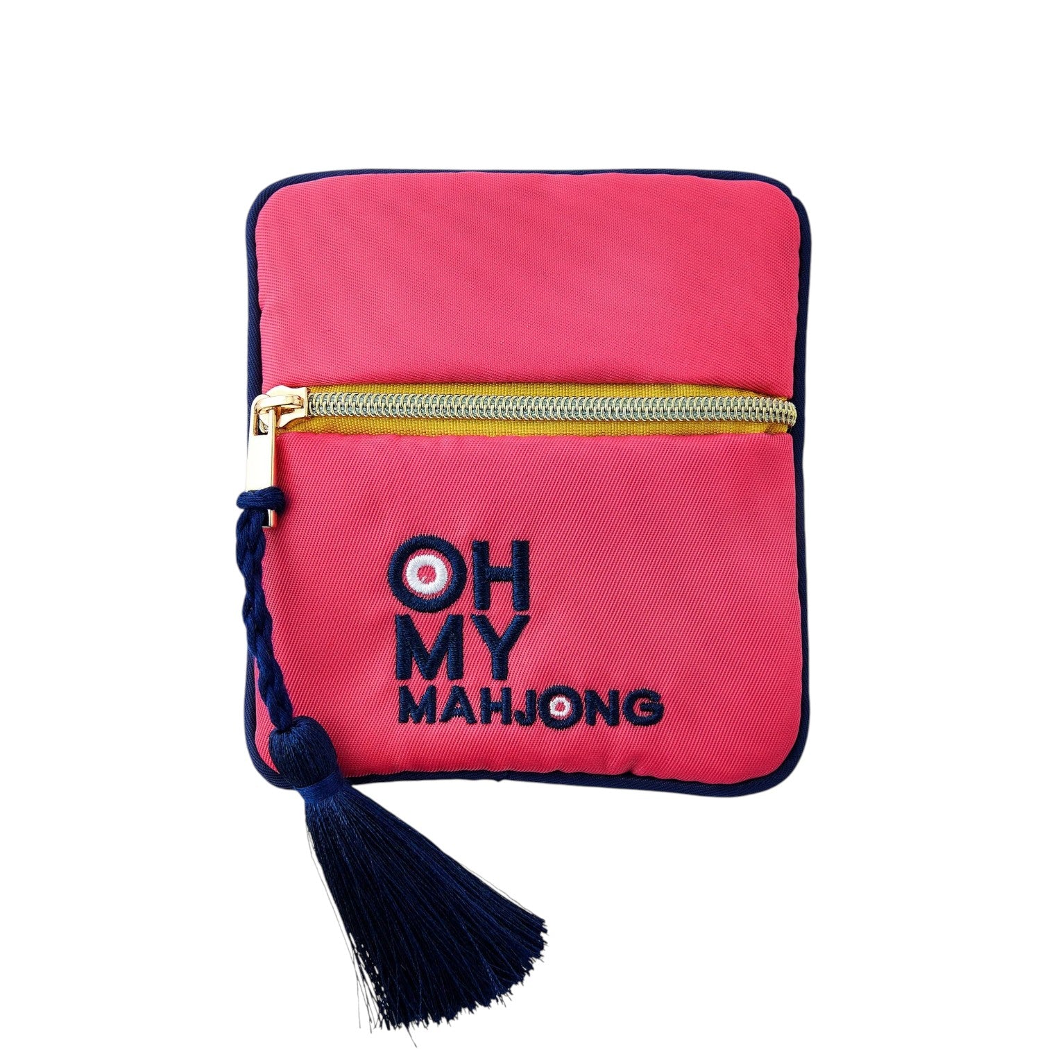 The Pink Coin & Dice Bag by Oh My Mahjong features a strawberry pink zippered pouch with a gold zipper, navy blue tassel, and "OH MY MAHJONG" embroidered on the front—perfect for storing coins or dice in style.