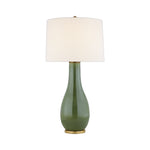 The Form Table Lamp, Shellish Kiwi by Visual Comfort features a glossy green ceramic base with gold accents and a white cylindrical shade, offering a sculptural look ideal for contemporary spaces.