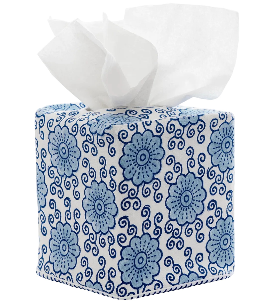 Damini Indigo Tissue Box Cover featuring a square, hand block printed blue and white floral and scroll pattern, with a white tissue pulled through the top.