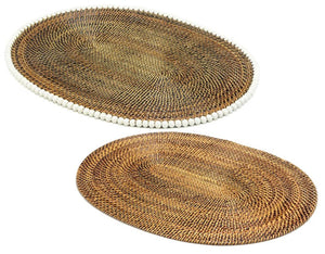 Set of two handcrafted Oval Placemats by Calaisio, made from natural vines: one with a white beaded border on top and one classic borderless design on the bottom.