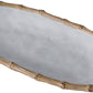 An oval-shaped white ceramic tray with a bamboo-look rim from the Beatriz Ball Vida Natural Bamboo Serveware Collection, designed for durability and break resistance.