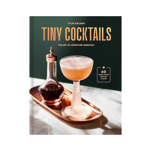 The "Tiny Cocktails" book by Rizzoli features a cover with a small cocktail in a stemmed glass and decanter on a copper tray against a dark background. Explore creative miniature mixology recipes for any occasion.