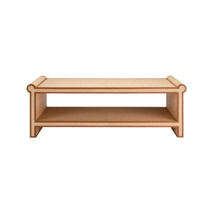 The Matthew Coffee Table by Made Goods features a rectangular raffia design with rounded edges, a unique shape, and an open lower shelf, shown from the front against a white background.