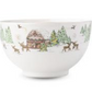 White ceramic bowl from the Juliska Berry & Thread North Pole Serveware Collection, featuring a painted winter scene of a cabin, evergreen trees, and reindeer.