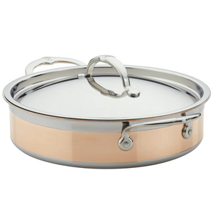 The Hestan CopperBond Copper Induction Sauteuse, 3.5qt, is a shallow stainless steel and copper pan with lid and dual handles, designed for induction use and shown against a white background.