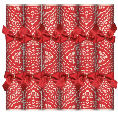 The Caspari Annika Red Crackers showcase exquisite red and white patterns, enhanced with luxury embellishments and signature Caspari paper designs, adorned with elegant red bows. They are attractively arranged in three rows of four, ideal for bringing a festive flair to your holiday celebrations.