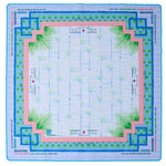 The Mahjong Mat Collection by Oh My Mahjong features a square neoprene, non-slip game board with bamboo designs, blue and pink borders, and marked areas for dragons, jokers, winds, and instructions around the edges.