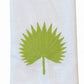 Haute Home Palm Leaf Bath Collection white Italian linen cloth napkin featuring an embroidered green palm leaf design in the center.