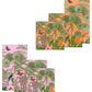 Two sets of botanical art prints—one with an orange, the other a pink background—feature plants, butterflies, and birds. Pair them with Caspari’s Paradise Garden Napkin Collection for a vibrant tropical table setting.