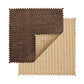 Two rectangular fabric swatches with zigzag edges, one brown and one beige, overlap on a white background, highlighting the subtle basketweave pattern of the Kim Seybert Vista Reversible Placemat.