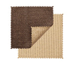 Two rectangular fabric swatches with zigzag edges, one brown and one beige, overlap on a white background, highlighting the subtle basketweave pattern of the Kim Seybert Vista Reversible Placemat.