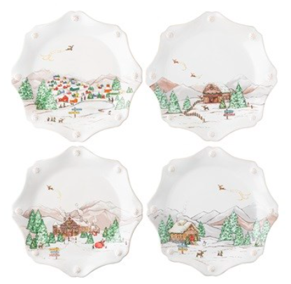 Four white scalloped appetizer plates from the Juliska Berry & Thread North Pole Serveware Collection, each featuring a hand-painted winter village scene with snowy mountains, pine trees, and a reindeer.