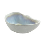 The AE Ceramics Large Sauce Bowl Collection features irregularly shaped ceramic bowls with a white exterior and light blue interior, ideal for bringing handmade charm to your tabletop accessories.