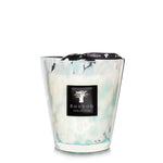 Baobab Pearls Sapphire candle in a decorative hand-blown glass jar with a marbled white and turquoise pattern, isolated on a white background.