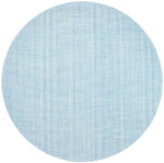 The Kim Seybert Portofino Placemat features a round, light blue design with a subtle woven vinyl texture and faint intersecting lines, and is easy to clean.