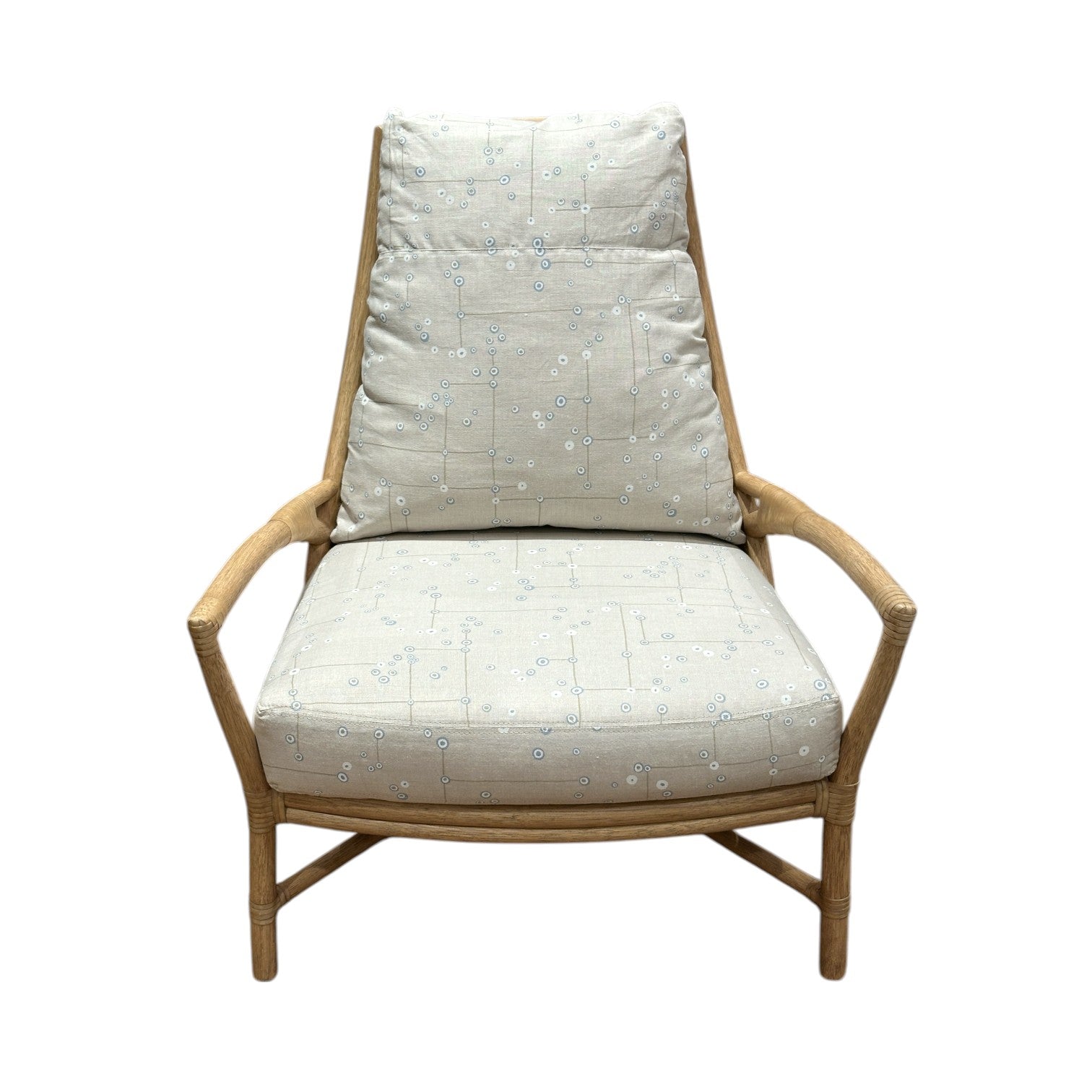 The Petal Lounge Chair by McGuire Furniture features a sculptural wooden frame with light, patterned cushions on the seat and backrest, making it a statement piece shown against a white background.