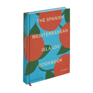 Published by Phaidon, "The Spanish Mediterranean Islands Cookbook" spotlights Balearic Islands cuisine with vibrant Mediterranean recipes and a striking blue cover with red and green abstract designs.