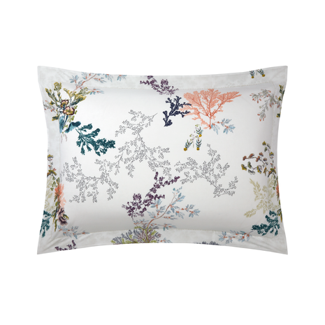 The Naiades Bedding Collection pillowcase by Yves Delorme features a botanical and bee print in green, purple, coral, and blue on white organic cotton for comfort and style.
