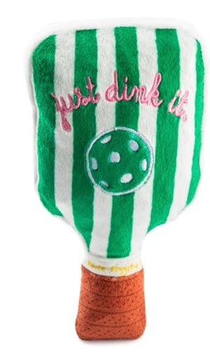 The Haute Diggity Dog Green Stripe Pickleball Paddle Plush Toy is a green and white striped, squeaky dog toy with a brown handle and “just dink it” in pink—great for playtime!.