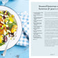 The “Picnic” by Simon & Schuster is pictured here: a vibrant plate of roasted butternut squash, beetroot, goat’s cheese, and fresh salad greens rests on a blue surface beside a checked napkin and fork, with the recipe displayed on the right—making it an excellent pick for summer picnics or alfresco dining.