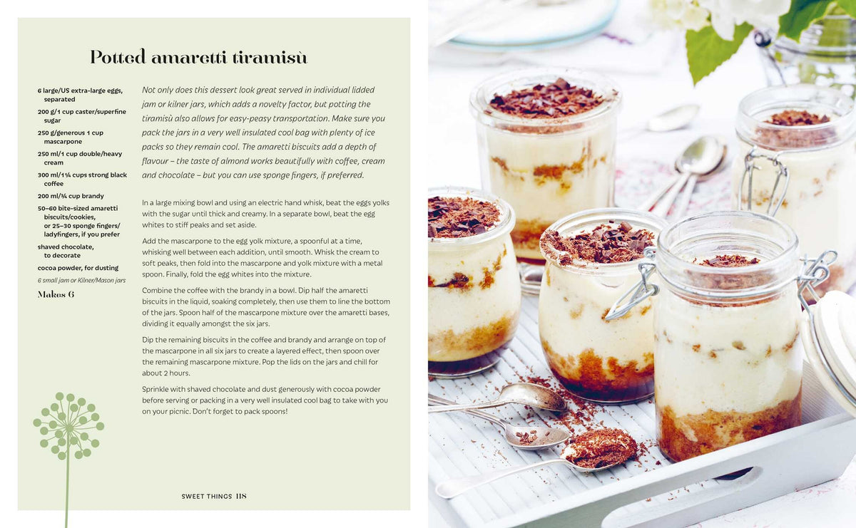 Four glass jars filled with layered Picnic by Simon & Schuster are topped with chocolate shavings and arranged on a white tray alongside spoons; the recipe is printed on the left side of the image—an irresistible treat perfect for summer picnics and outdoor dining.