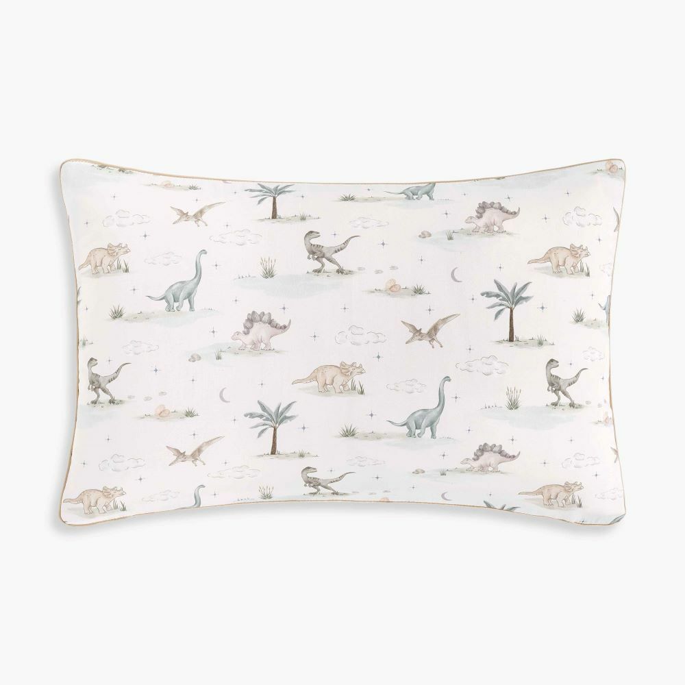 From the Dino Dreams Bedding Collection by Gooselings, this rectangular white pillow features a charming pattern of various dinosaurs, trees, clouds, and crescent moons in soft pastel colors. Crafted from breathable materials and OEKO-TEX certified, it ensures comfort and safety for your baby.
