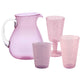 The Memento Pink Acrylic Drinkware Collection features a translucent pink pitcher with a clear handle, shown beside three matching pink pieces—stylish, functional acrylics ideal for outdoor dining.