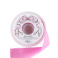 A partially unrolled spool of Hester & Cook’s Fancy Ribbon in pink satin, ideal for gift wrapping, is displayed on a white background with a label featuring printed scissors and ribbon illustrations.