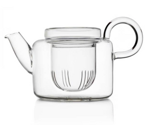 The Ichendorf Milano Piuma Small Teapot with Filter features clear glass, a round handle, short spout, and built-in filter for elegant tea brewing, shown against a white background.