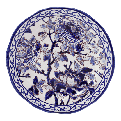 Round ceramic plate from the Pivoines Bleues Dinnerware Collection by Gien France, featuring a blue and white floral design with large Blue Peonies, leaves, and a decorative border inspired by the brand’s prestige archives.