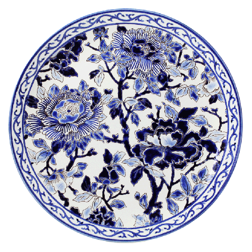 The Pivoines Bleues Dinnerware and Serveware Collection by Gien France features a round porcelain plate with a blue and white floral design of blooming peonies and leaves, bordered by an intricate blue pattern inspired by Gien's prestige archives.