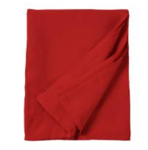 A folded red Berry Scallop Napkin with a scalloped edge.
