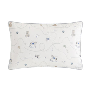 The Gooselings Little Toy Chest Bedding Collection features a rectangular white kids pillow with a light gray border and playful rocking horses, blocks, balls, kites, and blue crowns—perfect for cozy children’s bedding and sweet dreams.