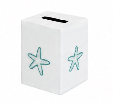 A white rectangular box with a slot on top, featuring two blue starfish illustrations from the Playful Starfish Bath Collection by Haute Home—an elegant accent that brings coastal charm to your home décor, reminiscent of the timeless appeal of premium linen.