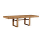 The Dariel Extension Dining Table by Made Goods features a rectangular wooden top and two wide pedestal legs with natural burl patterns, shown against a white background.