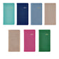 Seven Graphic Image 2027 Pocket Datebooks in a variety of colors—teal, navy, light blue, beige, gold, pink, and green—are displayed in two neat rows on a white background. Ideal as a personal pocket journal or compact pocket diary, these planners are thoughtfully designed to help keep you organized all through 2027.