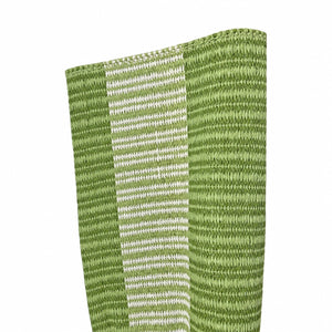 Close-up of the Laila Rug in Moss & White by Magdalena York, featuring hand-woven vertical stripes, shown against a plain white background.