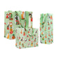 The Presenting Pets Collection by Caspari features three green gift bags with festive dogs and cats, striped patterns, and green handles—ideal for pairing with elegant paper plates or disposable tableware at your holiday gatherings.