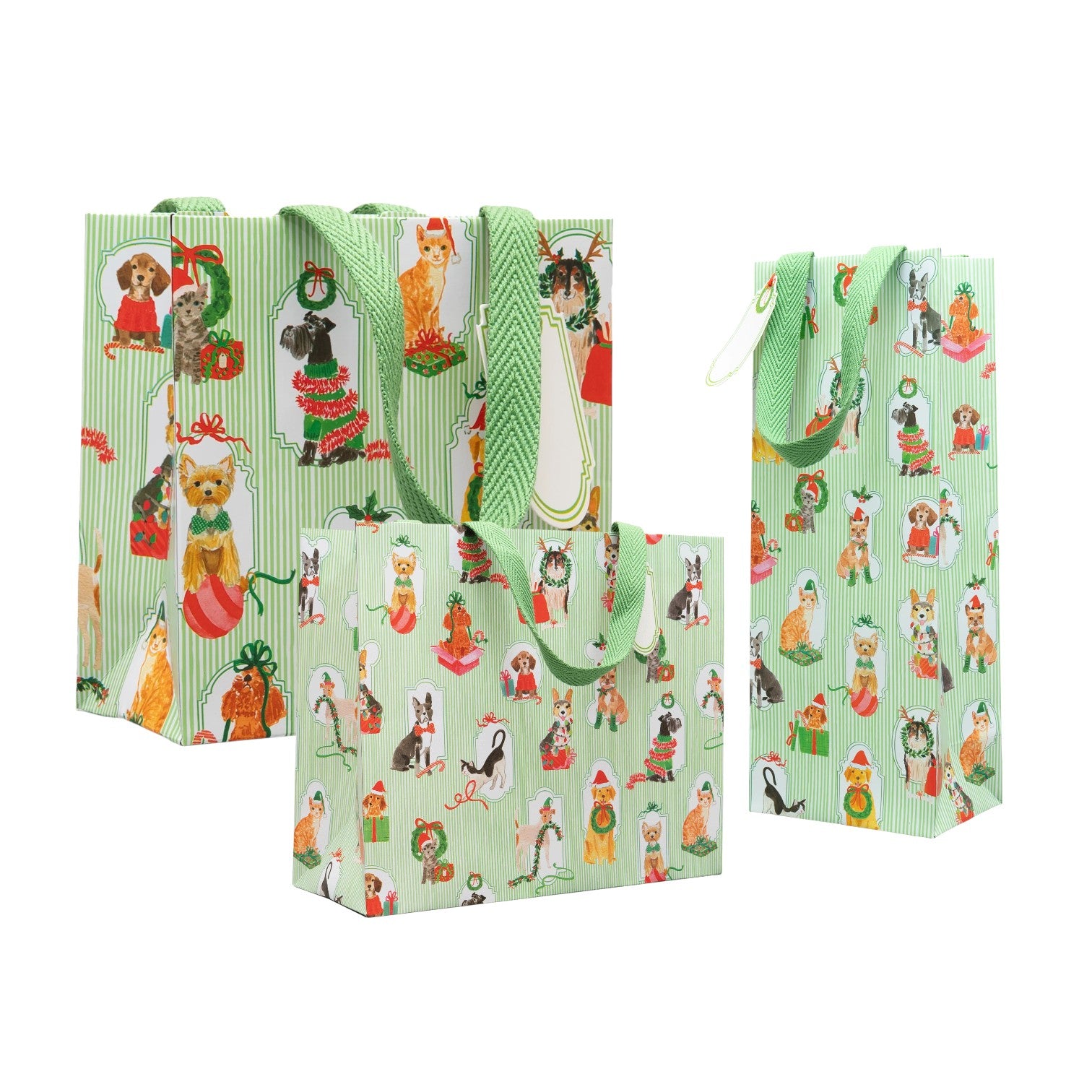 The Presenting Pets Collection by Caspari features three green gift bags with festive dogs and cats, striped patterns, and green handles—ideal for pairing with elegant paper plates or disposable tableware at your holiday gatherings.