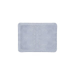 The Prestige Shagreen Decor Collection tray by HestiaLiving is a rectangular, light blue piece with small white dots, shown from above on a white background—an elegant touch for any room.