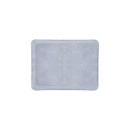 The Prestige Shagreen Decor Collection tray by HestiaLiving is a rectangular, light blue piece with small white dots, shown from above on a white background—an elegant touch for any room.