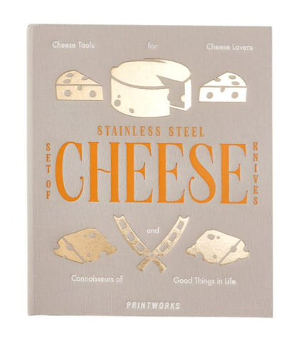 The PrintWorks Cheese Tool Set features stainless steel utensils in a boxed kit with charming illustrations—an ideal gift for cheese lovers and connoisseurs.