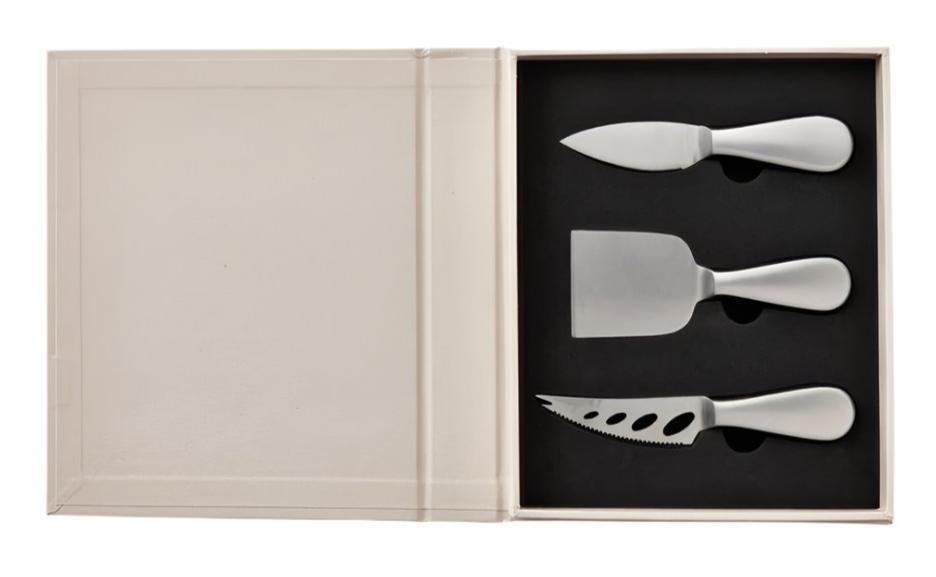 The PrintWorks Cheese Tool Set features stainless steel-handled knives arranged in foam cutouts inside a beige box with an empty compartment—an elegant addition to any cheese board kit.